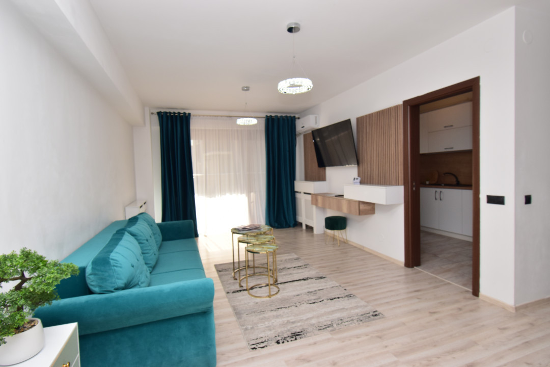 Apartament central, loc de parcare, gradina proprie, mobilat si utilat modern 