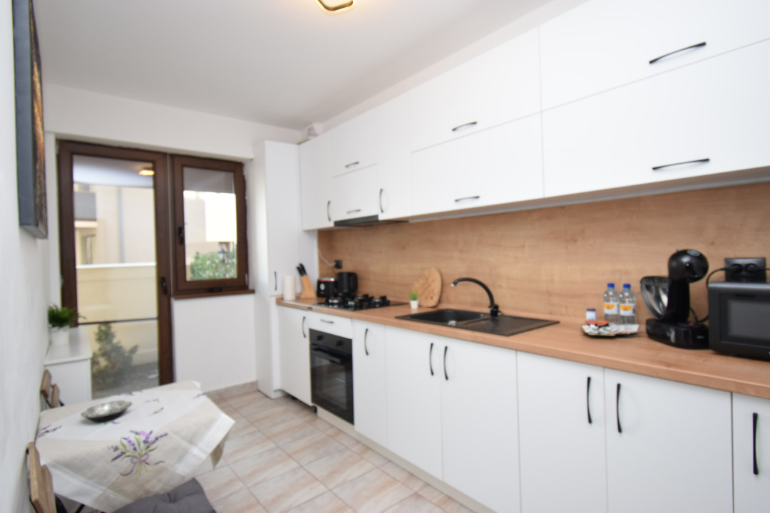 Apartament central, loc de parcare, gradina proprie, mobilat si utilat modern 