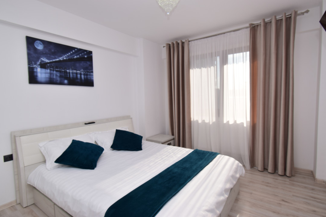 Apartament central, loc de parcare, gradina proprie, mobilat si utilat modern 