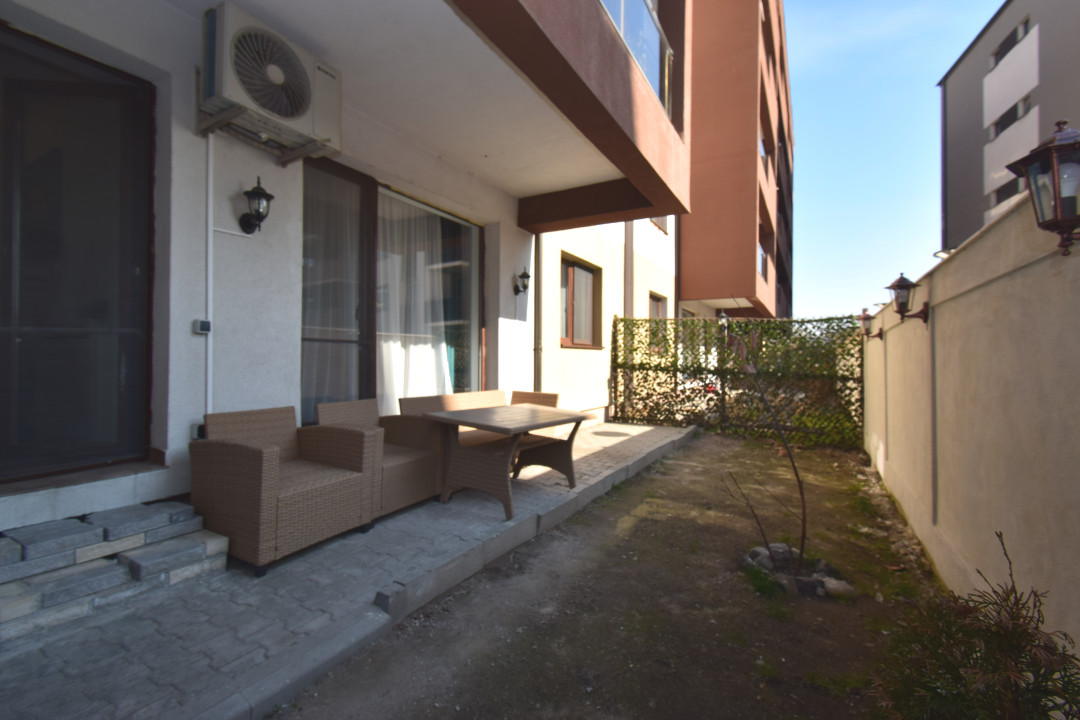 Apartament central, loc de parcare, gradina proprie, mobilat si utilat modern 