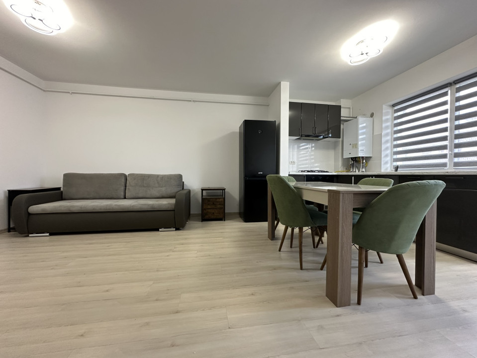 Apartament tip studio, mobilat, loc de parcare, bloc nou